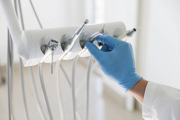Professional Emergency Dentist technician working in Burton, MI